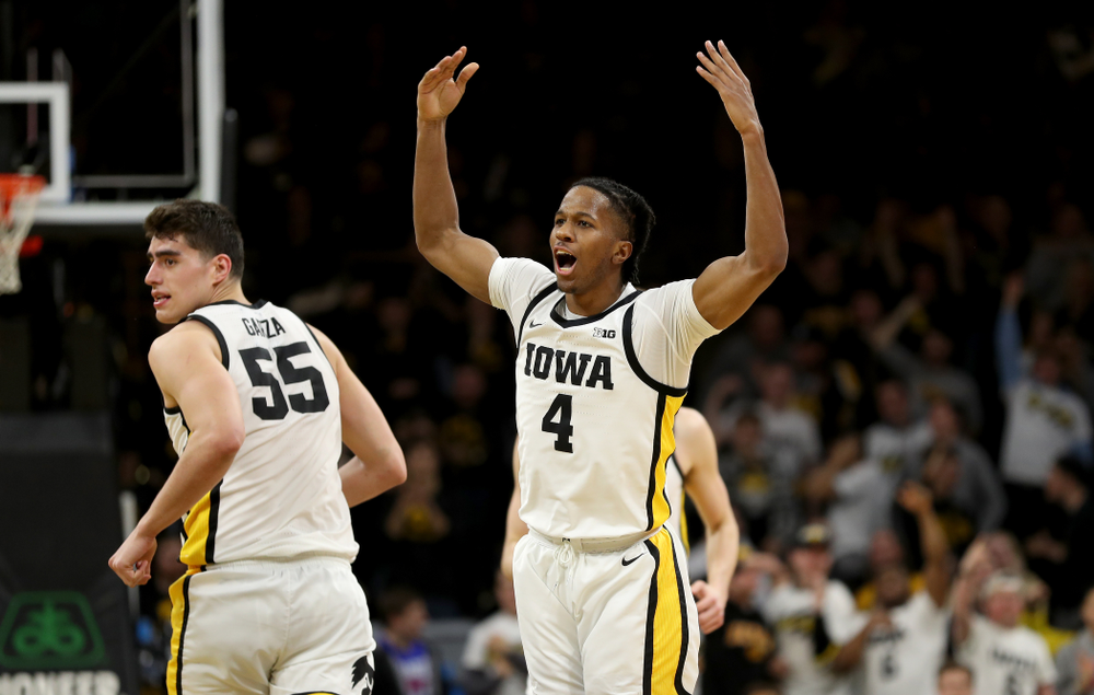 Iowa Hawkeyes guard Bakari Evelyn (4) celebrates a three point basket against the Ohio State Buckeyes Thursday, February 20, 2020 at Carver-Hawkeye Arena. (Brian Ray/hawkeyesports.com)