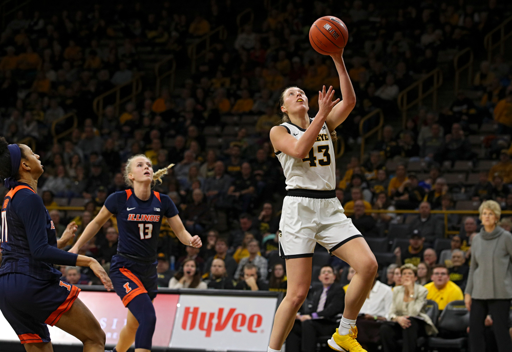 Iowa Hawkeyes forward Amanda Ollinger (43) scores a basket during the fourth quarter of their game at Carver-Hawkeye Arena in Iowa City on Tuesday, December 31, 2019. (Stephen Mally/hawkeyesports.com)