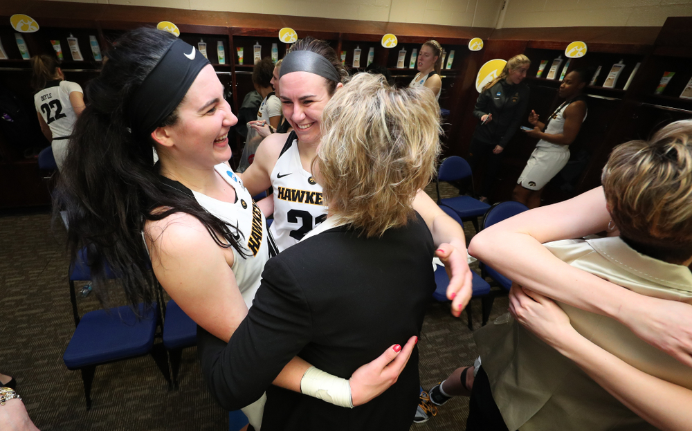 Iowa Hawkeyes forward Megan Gustafson (10), forward Hannah Stewart (21), and head coach Lisa Bluder against the NC State Wolfpack in the regional semi-final of the 2019 NCAA Women's College Basketball Tournament Saturday, March 30, 2019 at Greensboro Coliseum in Greensboro, NC.(Brian Ray/hawkeyesports.com)