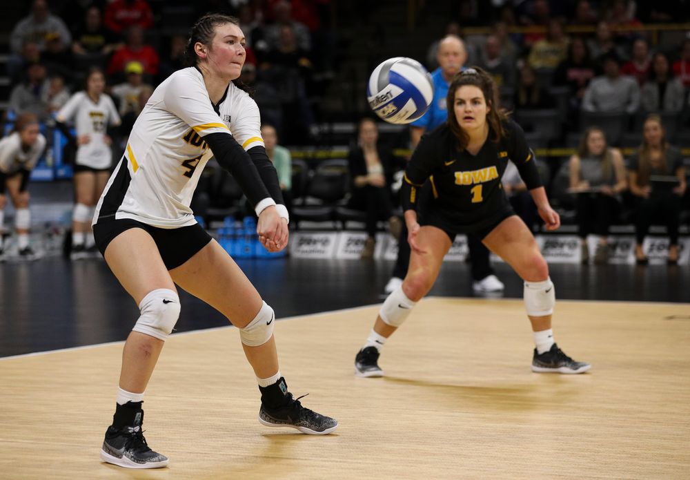 Iowa Hawkeyes defensive specialist Halle Johnston (4) bumps the ball during a match against Nebraska at Carver-Hawkeye Arena on November 7, 2018. (Tork Mason/hawkeyesports.com)