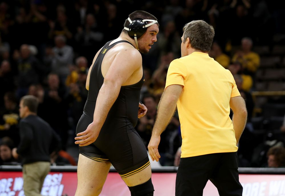 IowaÕs Tony Cassioppi wrestles WisconsinÕs Trent Hillger at heavyweight Sunday, December 1, 2019 at Carver-Hawkeye Arena. Cassioppi won the match 3-2. (Brian Ray/hawkeyesports.com)