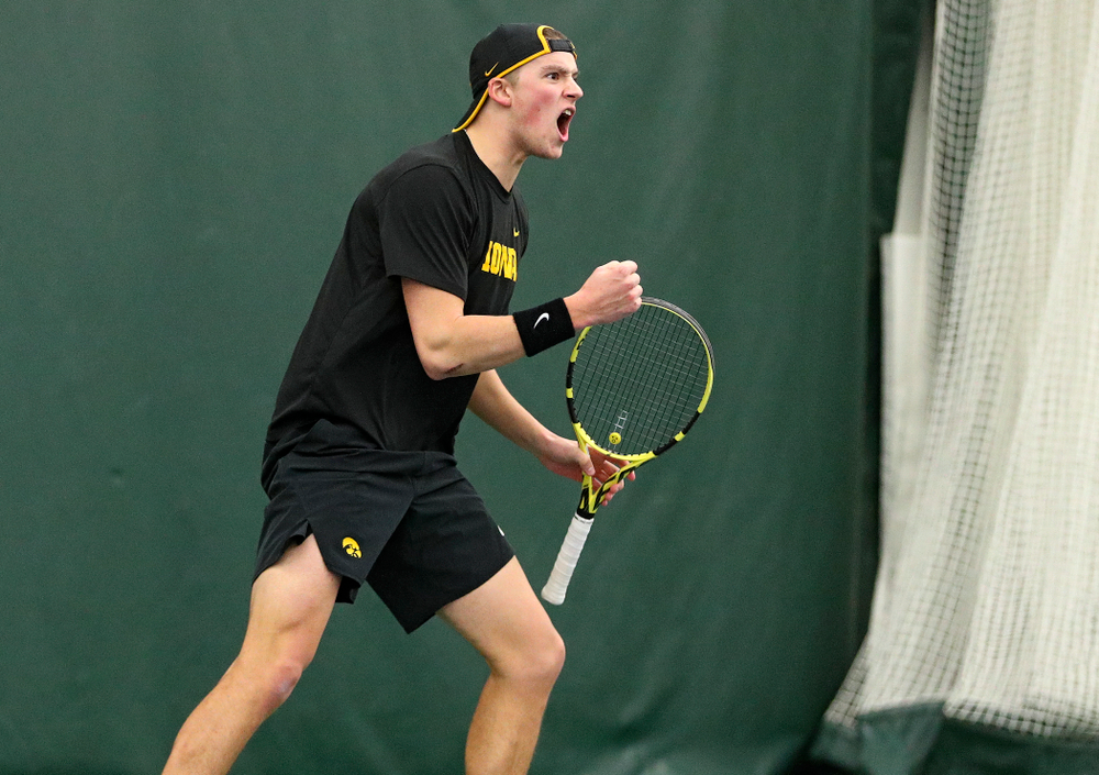 Iowa’s Joe Tyler celebrates a point during his singles match at the Hawkeye Tennis and Recreation Complex in Iowa City on Friday, February 14, 2020. (Stephen Mally/hawkeyesports.com)