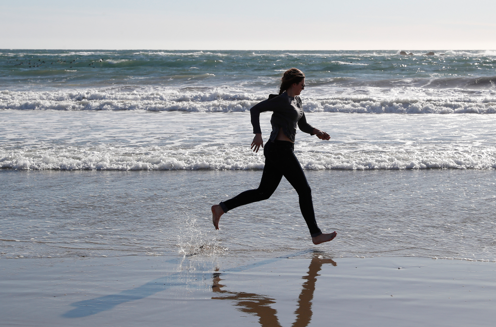 Iowa Hawkeyes forward Megan Gustafson (10) as they explore the beach Thursday, March 15, 2018 in Santa Monica. (Brian Ray/hawkeyesports.com)
