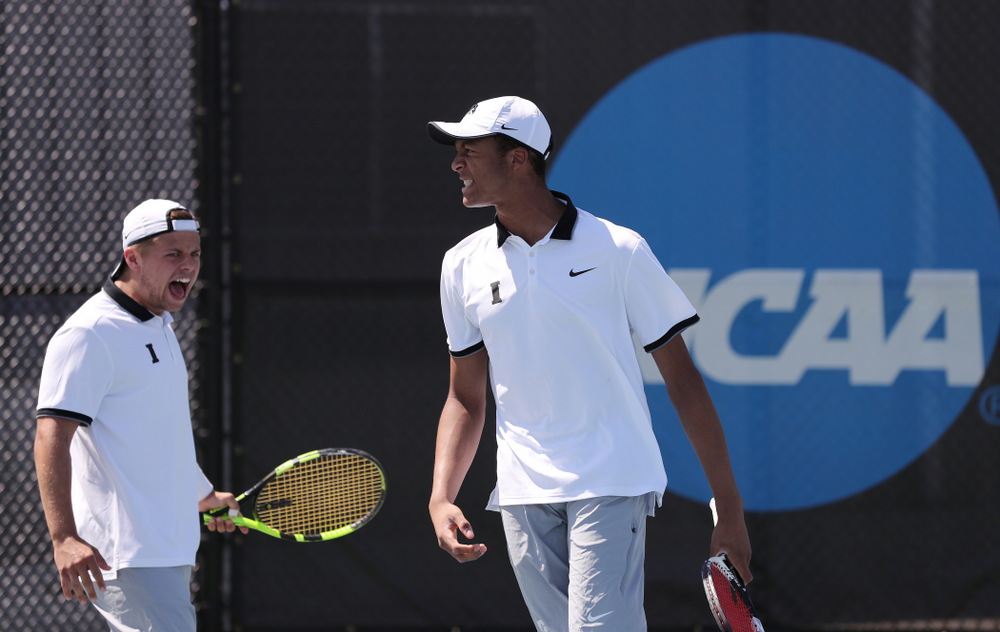 IowaÕs Oliver Okonkwo and Will Davies play a doubles match against the Michigan Wolverines Sunday, April 21, 2019 at the Hawkeye Tennis and Recreation Complex. (Brian Ray/hawkeyesports.com)