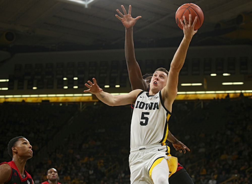 Iowa Hawkeyes guard CJ Fredrick (5) scores a basket during the first half of their game at Carver-Hawkeye Arena in Iowa City on Friday, Nov 8, 2019. (Stephen Mally/hawkeyesports.com)