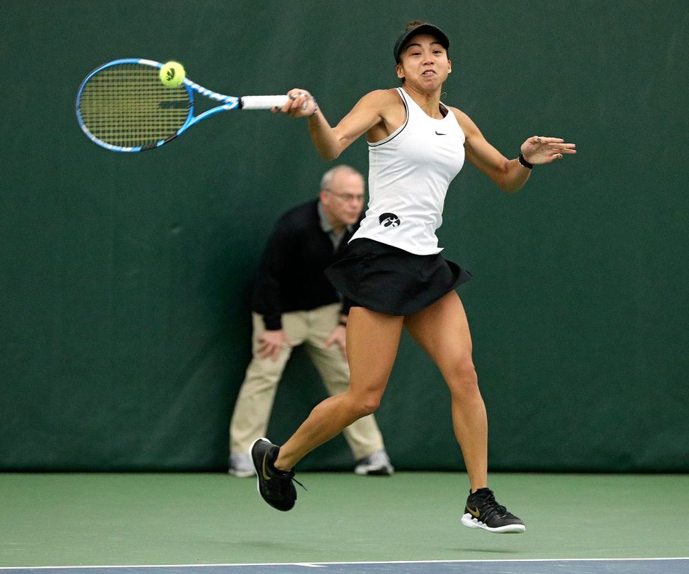 Iowa’s Michelle Bacalla returns a shot during her singles match at the Hawkeye Tennis and Recreation Complex in Iowa City on Sunday, February 16, 2020. (Stephen Mally/hawkeyesports.com)