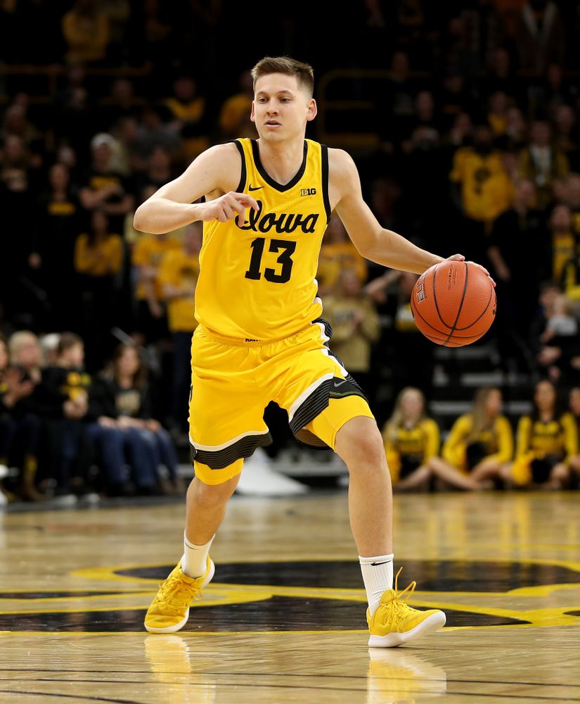 Iowa Hawkeyes guard Austin Ash (13) against the Nebraska Cornhuskers Saturday, February 8, 2020 at Carver-Hawkeye Arena. (Brian Ray/hawkeyesports.com)