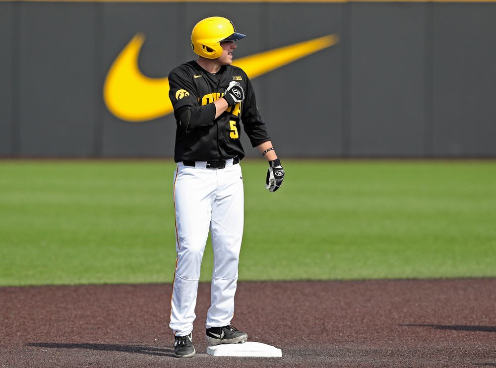 Iowa Hawkeyes first baseman Zeb Adreon (5) celebrates as he stands on second base after hitting an RBI double during the fourth inning of their game against Rutgers at Duane Banks Field in Iowa City on Saturday, Apr. 6, 2019. (Stephen Mally/hawkeyesports.com)