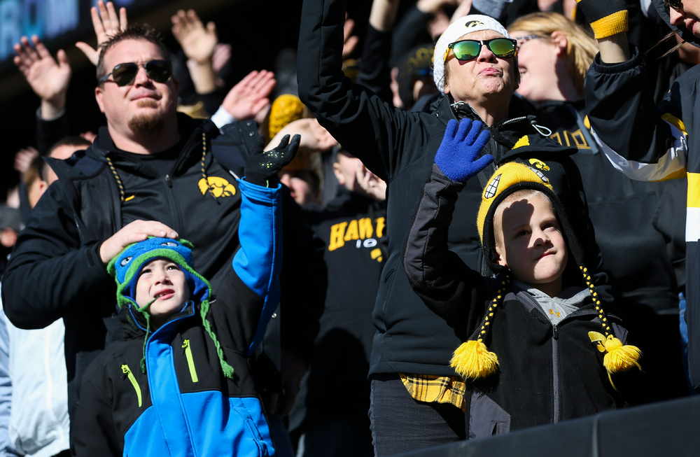 Iowa Hawkeyes fans wave to the Stead Family Childrens Hospital after the first quarter during a game against Maryland at Kinnick Stadium on October 20, 2018. (Tork Mason/hawkeyesports.com)