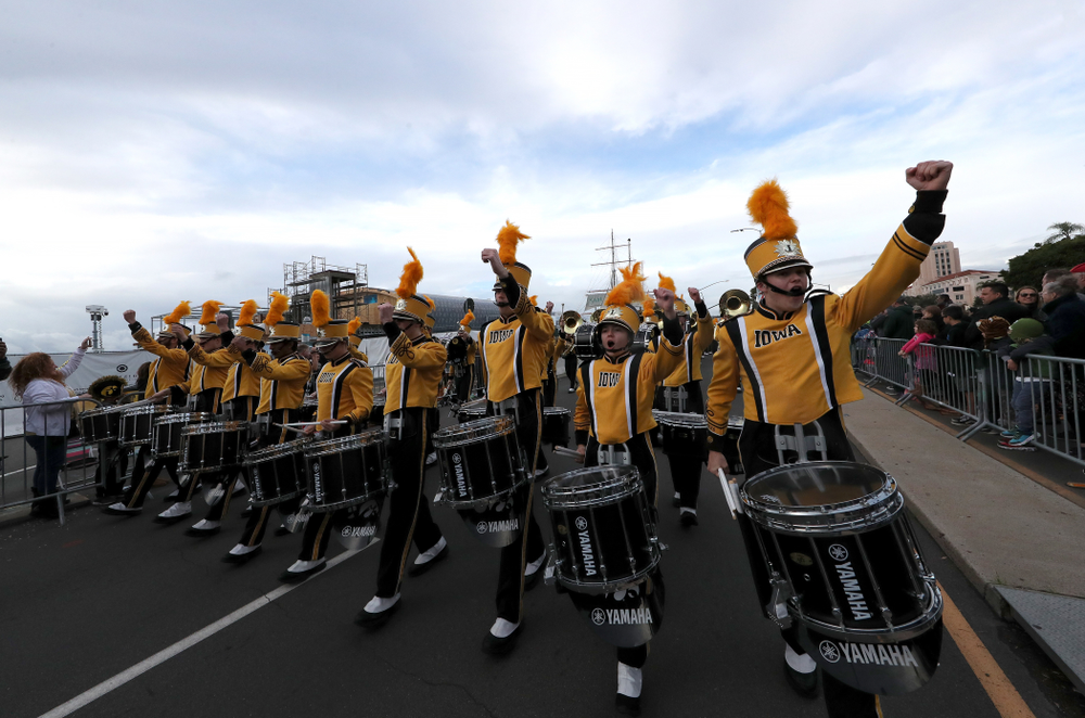 The Hawkeye Marching Band and the Iowa Spirit Squad march in the Holiday Bowl Parade Thursday, December 26, 2019 in San Diego. (Brian Ray/hawkeyesports.com)