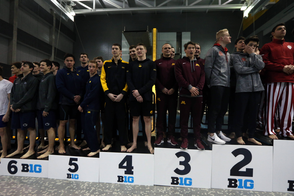 Iowa's Joe Myhre, Jack Smith, Will Scott, and Steve Fiolic after the 200-yard freestyle relay race Friday, March 1, 2019 at the Campus Recreation and Wellness Center. (Lily Smith/hawkeyesports.com)