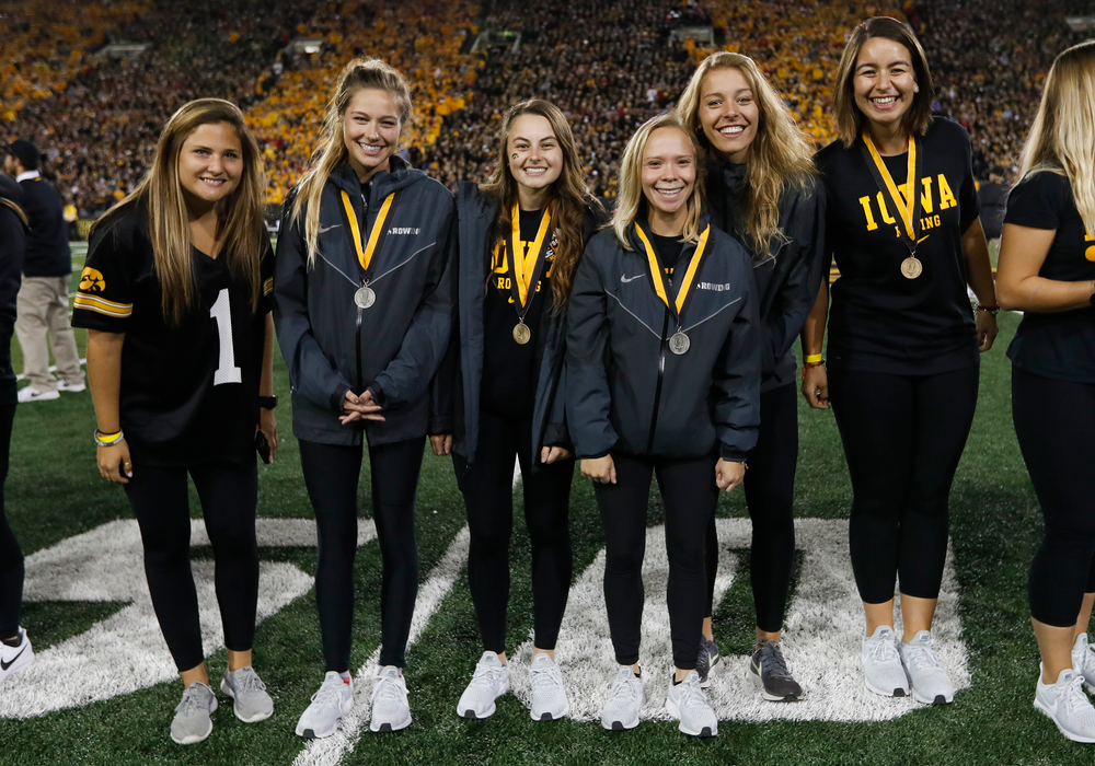 Members of the Iowa rowing team are recognized by the Presidential Committee on Athletics at halftime during a game against Wisconsin on September 22, 2018. (Tork Mason/hawkeyesports.com)