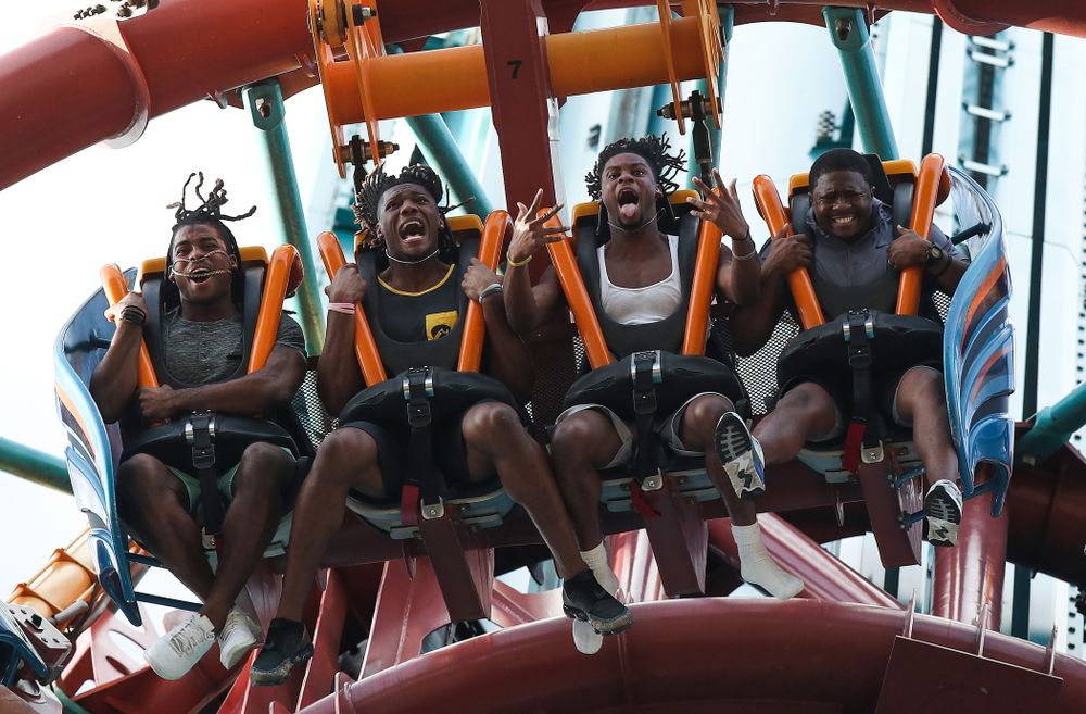 Iowa Hawkeyes defensive back Devonte Young (17), wide receiver Brandon Smith (12), wide receiver Ihmir Smith-Marsette (6), and and running backs coach Derrick Foster ride Falcon's Fury during an Outback Bowl team event Saturday, December 29, 2018 at Busch Gardens in Tampa, FL. (Brian Ray/hawkeyesports.com)