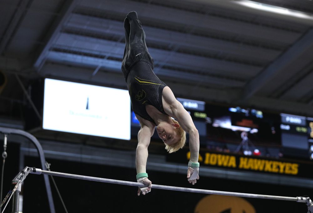 Iowa's Nick Merryman competes on the high bar against the Ohio State Buckeyes Saturday, March 16, 2019 at Carver-Hawkeye Arena. (Brian Ray/hawkeyesports.com)