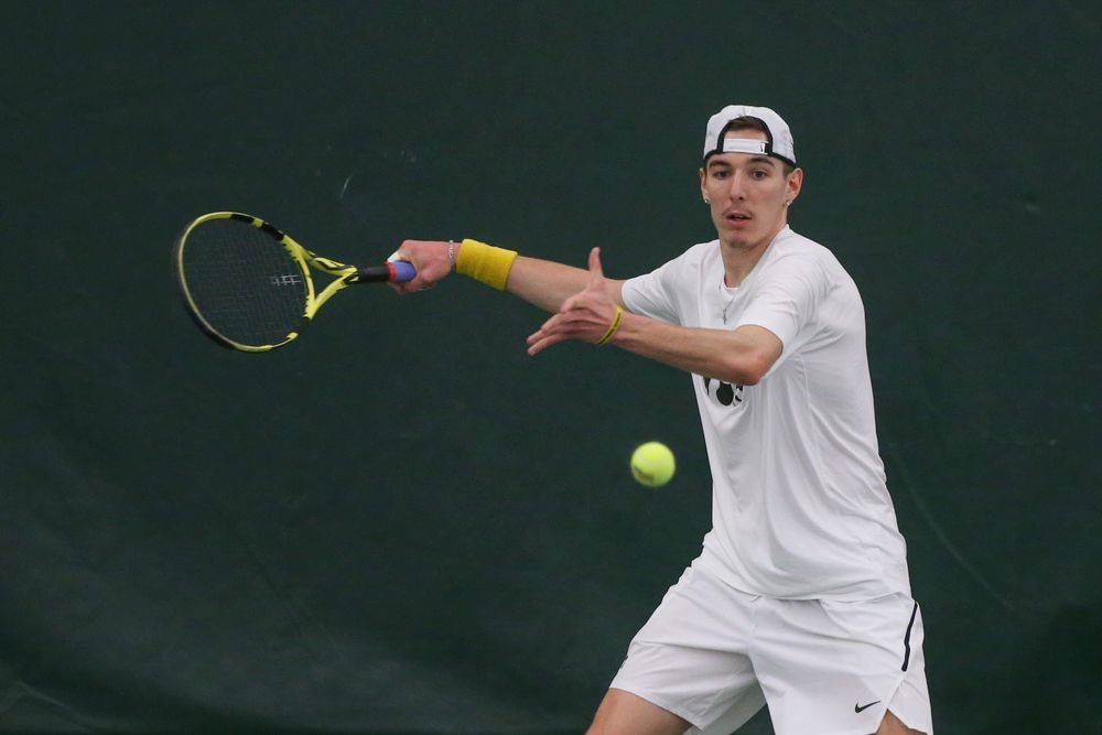 Iowa’s Nikita Snezhko returns a hit during the Iowa men’s tennis meet vs Nebraska on Sunday, March 1, 2020 at the Hawkeye Tennis and Recreation Complex. (Lily Smith/hawkeyesports.com)