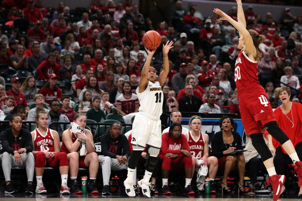 Iowa Hawkeyes guard Tania Davis (11) knocks down a three point basket against the Indiana Hoosiers in the quarterfinals of the Big Ten Tournament Friday, March 8, 2019 at Bankers Life Fieldhouse in Indianapolis, Ind. (Brian Ray/hawkeyesports.com)