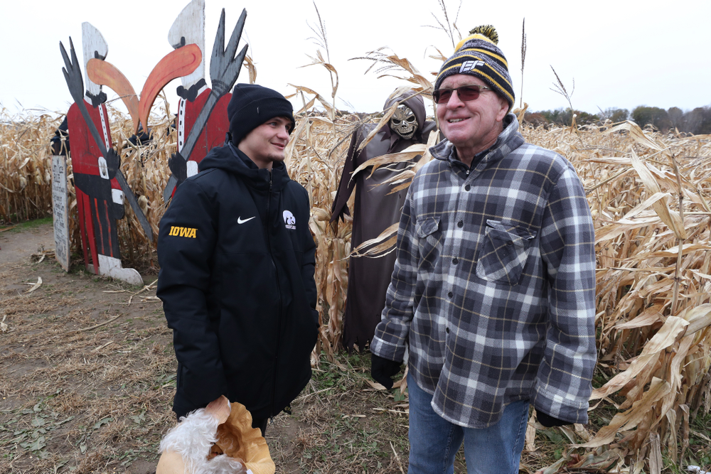 Gavin Teasdale talks with legendary former head coach Dan Gable during the teamÕs annual media day Wednesday, October 30, 2019 at Kroul Family Farms in Mount Vernon. (Brian Ray/hawkeyesports.com)