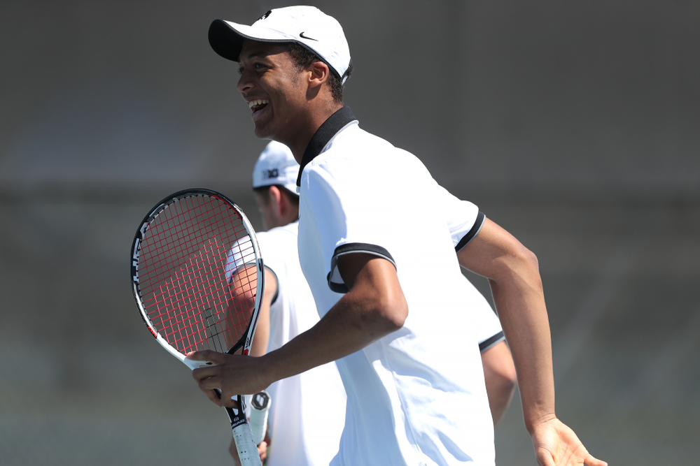 IowaÕs Oliver Okonkwo and Will Davies play a doubles match against the Michigan Wolverines Sunday, April 21, 2019 at the Hawkeye Tennis and Recreation Complex. (Brian Ray/hawkeyesports.com)