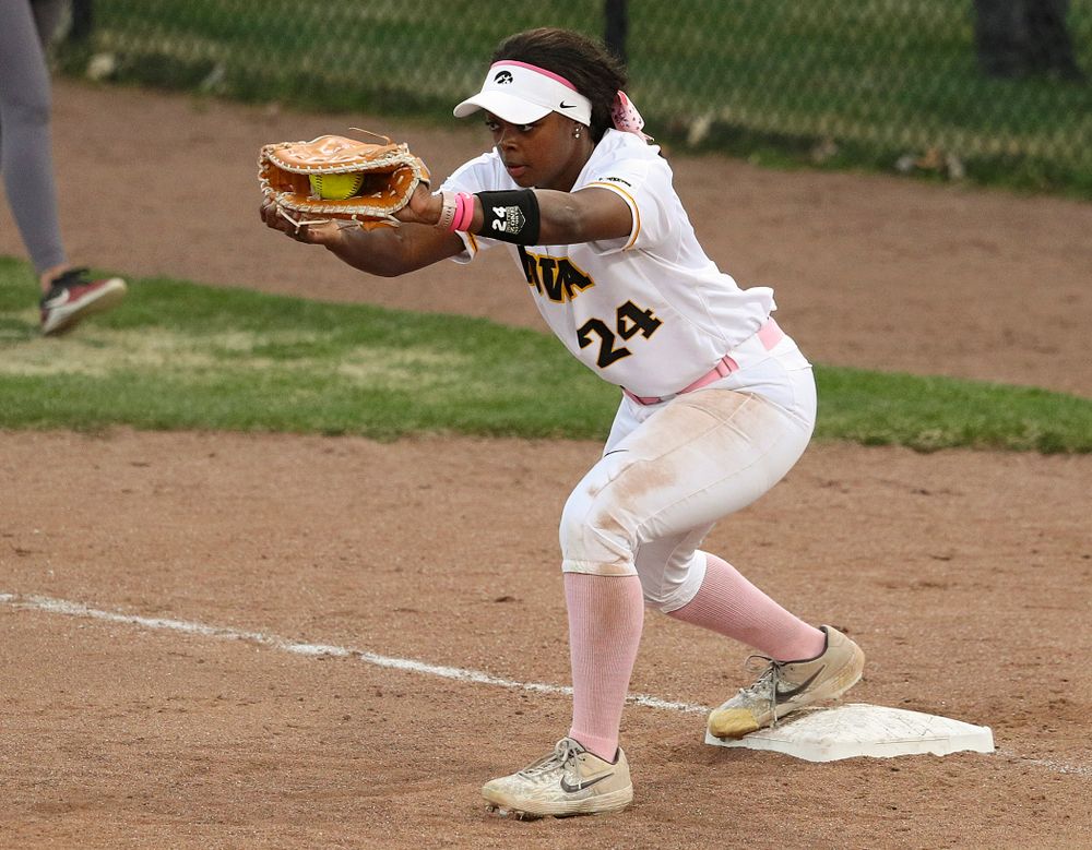 Iowa first baseman DoniRae Mayhew (24) pulls in a throw for an out during the third inning of their game against Iowa State at Pearl Field in Iowa City on Tuesday, Apr. 9, 2019. (Stephen Mally/hawkeyesports.com)