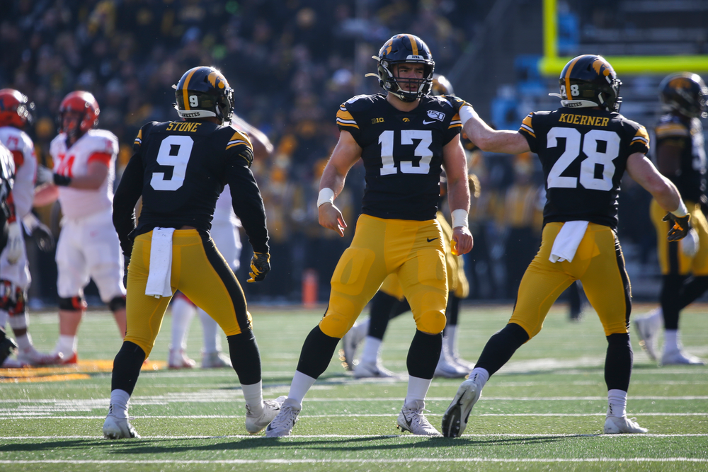 Iowa Hawkeyes defensive back Jack Koerner (28), Iowa Hawkeyes linebacker Joe Evans (13) and Iowa Hawkeyes defensive back Geno Stone (9) during Iowa football vs Illinois on Saturday, November 23, 2019 at Kinnick Stadium. (Lily Smith/hawkeyesports.com)