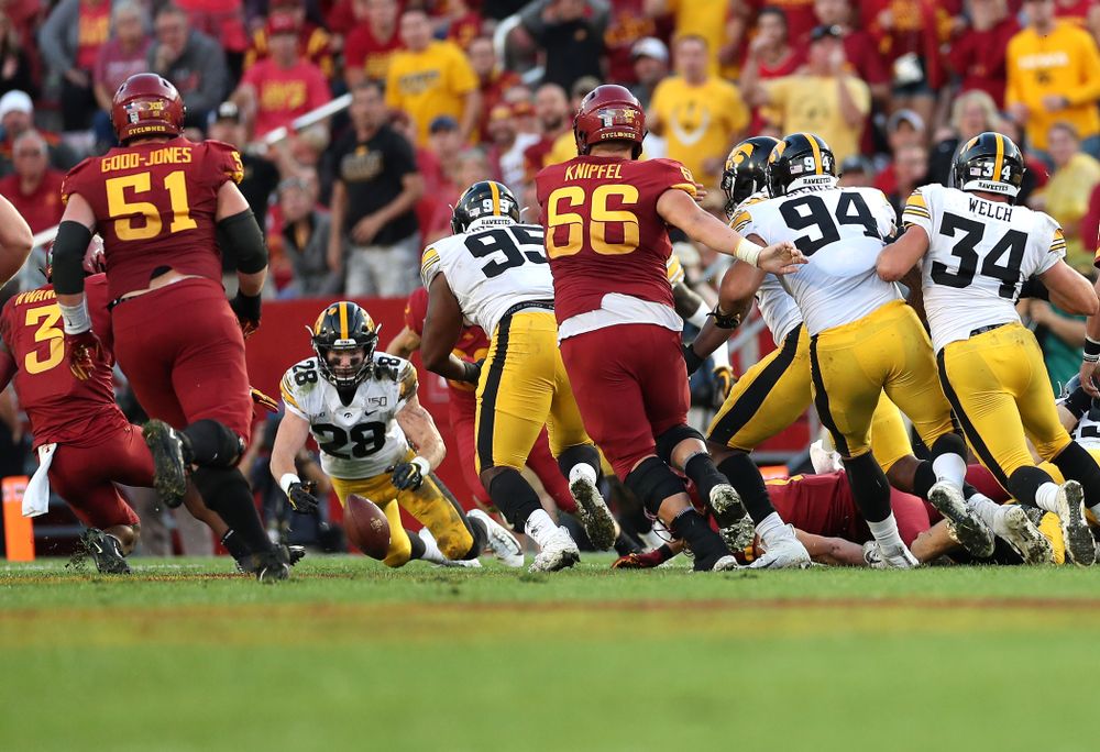 Iowa Hawkeyes defensive back Jack Koerner (28) recovers a fumble against the Iowa State Cyclones Saturday, September 14, 2019 in Ames, Iowa. (Brian Ray/hawkeyesports.com)
