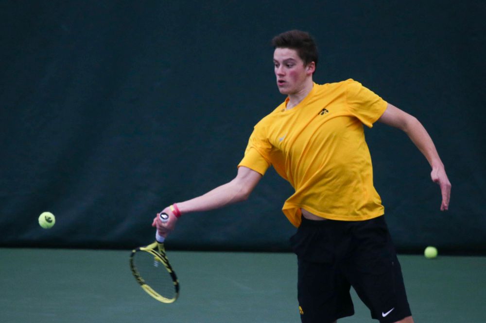Iowa's Piotr Smietana at a tennis match vs Drake Friday, March 8, 2019 at the Hawkeye Tennis and Recreation Complex. (Lily Smith/hawkeyesports.com)