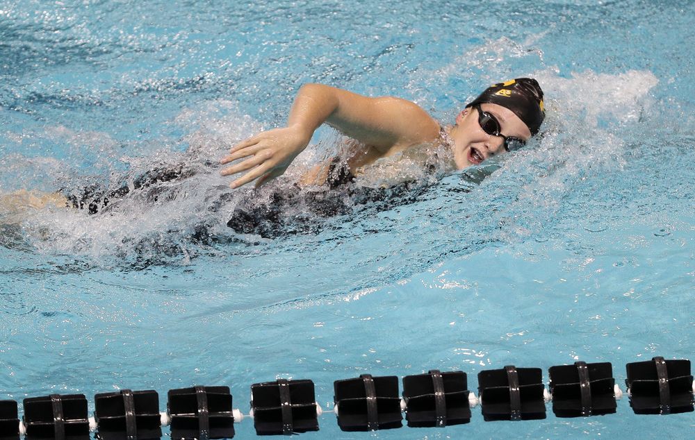 Iowa's Taylor Hartley competes in the 800-yard freestyle relay during the third day of the Hawkeye Invitational at the Campus Recreation and Wellness Center on November 16, 2018. (Tork Mason/hawkeyesports.com)
