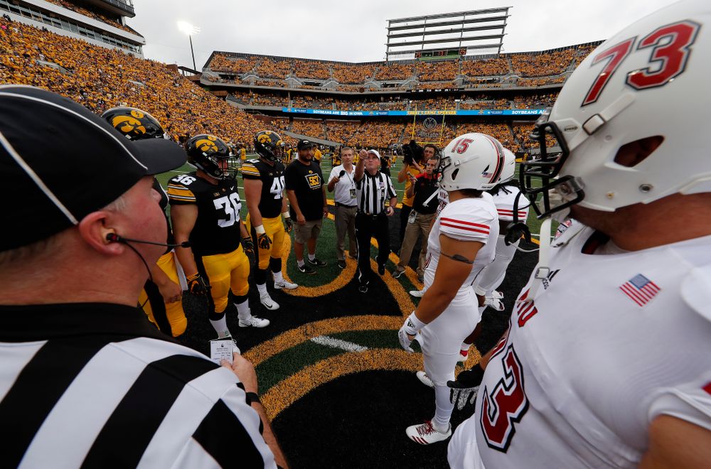 Captains Jake Gervase, Nate Stanley, Brady Ross, Parker Hesse, and Honorary Captain Julian Vandervelde against the Norther Illinois Huskies Saturday, September 1, 2018 . (Brian Ray/hawkeyesports.com)