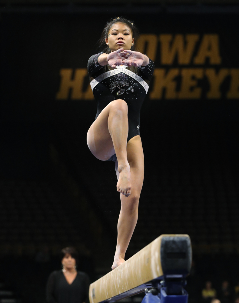 Iowa's Misty-Jade Carlson competes on the beam against the Rutgers Scarlet Knights Saturday, January 26, 2019 at Carver-Hawkeye Arena. (Brian Ray/hawkeyesports.com)