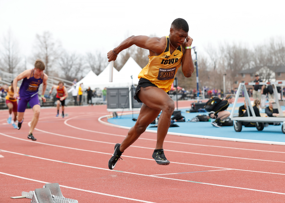Iowa's Anthony Williams leads off the 4x100 during the 2018 MUSCO Twilight Invitational Thursday, April 12, 2018 at the Cretzmeyer Track. (Brian Ray/hawkeyesports.com)
