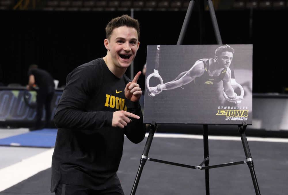 Iowa Men's Gymnast Jake Brodarzon and his family during senior day ceremonies following their meet against the Ohio State Buckeyes Saturday, March 16, 2019 at Carver-Hawkeye Arena. (Brian Ray/hawkeyesports.com)