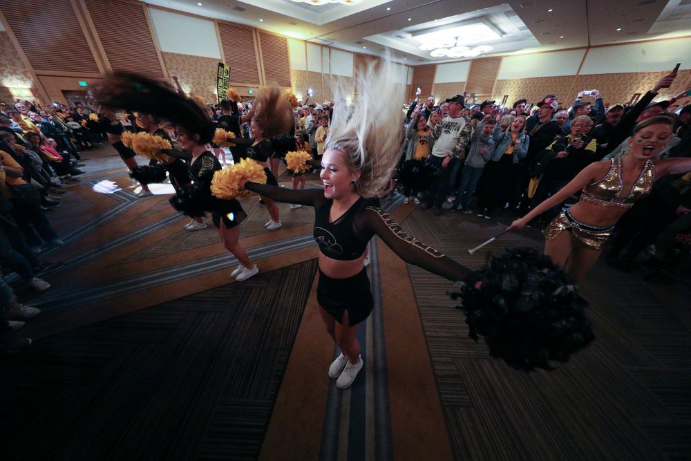 The Hawkeye Marching Band and the Iowa Spirit Squads perform during the Holiday Bowl Hawkeye Huddle Thursday, December 26, 2019 at the Hilton in downtown San Diego. (Brian Ray/hawkeyesports.com)