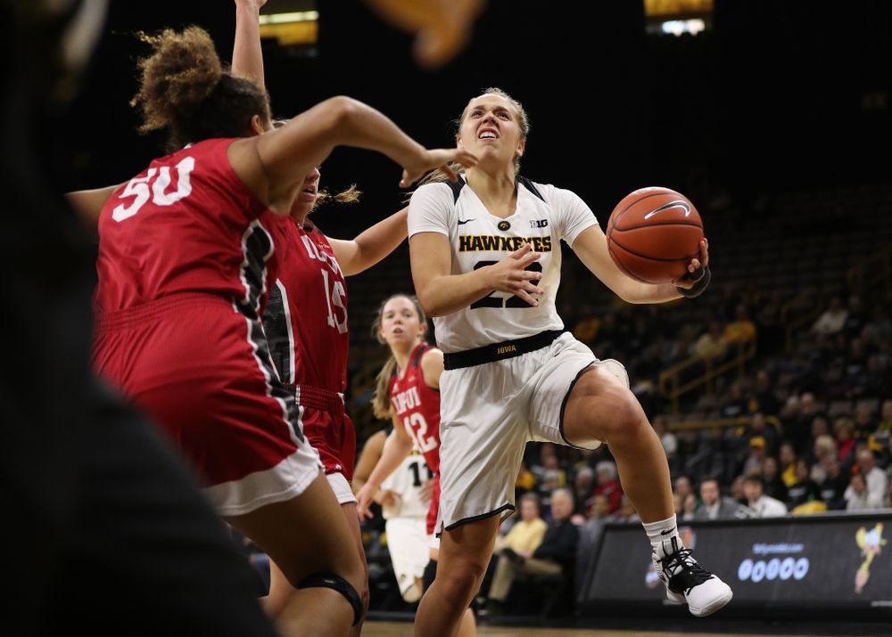 Iowa Hawkeyes guard Kathleen Doyle (22) against the IUPUI Jaguars Saturday, December 8, 2018 at Carver-Hawkeye Arena. (Brian Ray/hawkeyesports.com)
