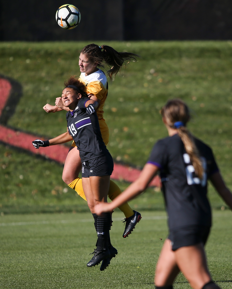 Iowa Hawkeyes defender Hannah Drkulec (17) heads the ball during a game against Northwestern at the Iowa Soccer Complex on October 21, 2018. (Tork Mason/hawkeyesports.com)