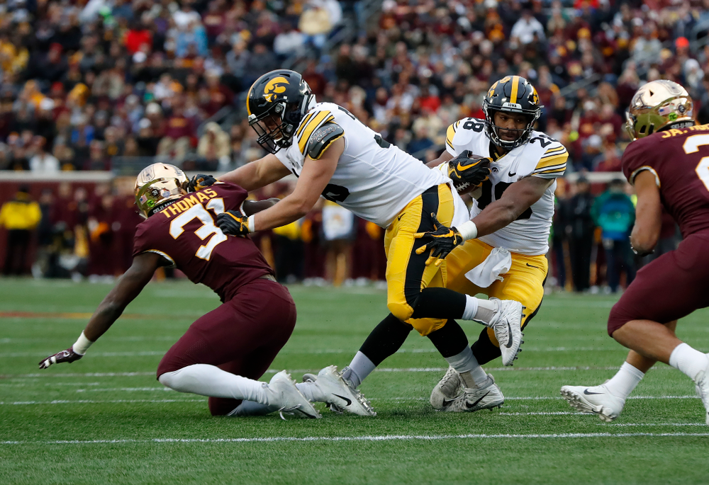 Iowa Hawkeyes fullback Brady Ross (36) blocks for running back Toren Young (28) against the Minnesota Golden Gophers Saturday, October 6, 2018 at TCF Bank Stadium. (Brian Ray/hawkeyesports.com)
