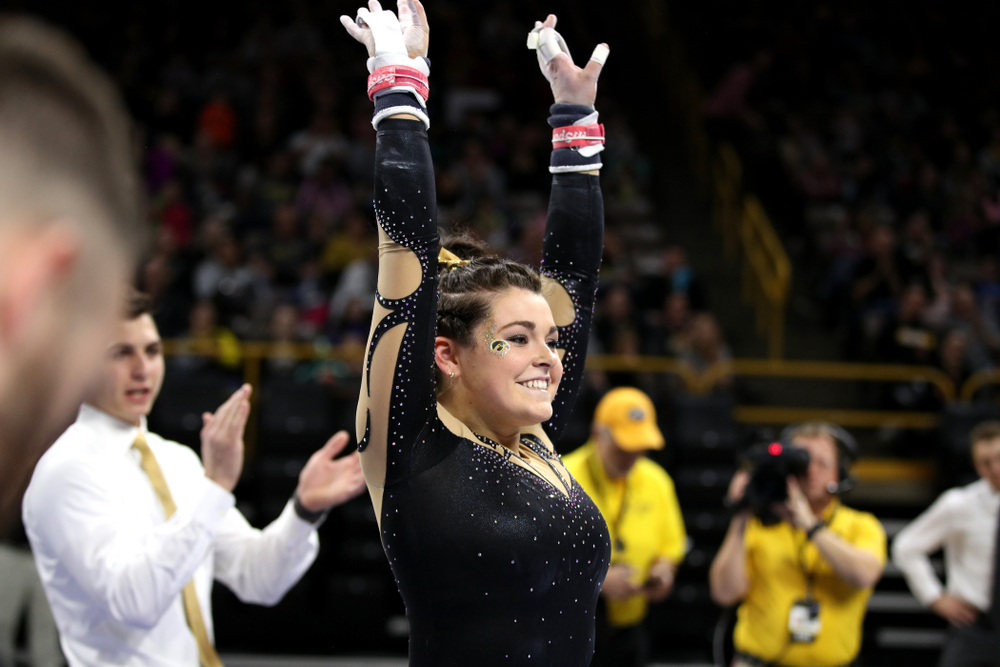 Iowa's Erin Castle competes on the bars during their meet against Southeast Missouri State Friday, January 11, 2019 at Carver-Hawkeye Arena. (Brian Ray/hawkeyesports.com)