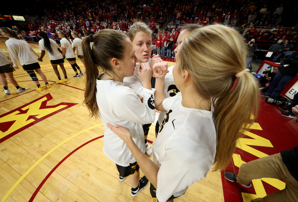 Iowa Hawkeyes forward/center Monika Czinano (25), forward Amanda Ollinger (43), Logan Cook (23), and forward/center Paula Vali?o Ramos (31) against the Iowa State Cyclones Wednesday, December 11, 2019 at Hilton Coliseum in Ames, Iowa(Brian Ray/hawkeyesports.com)