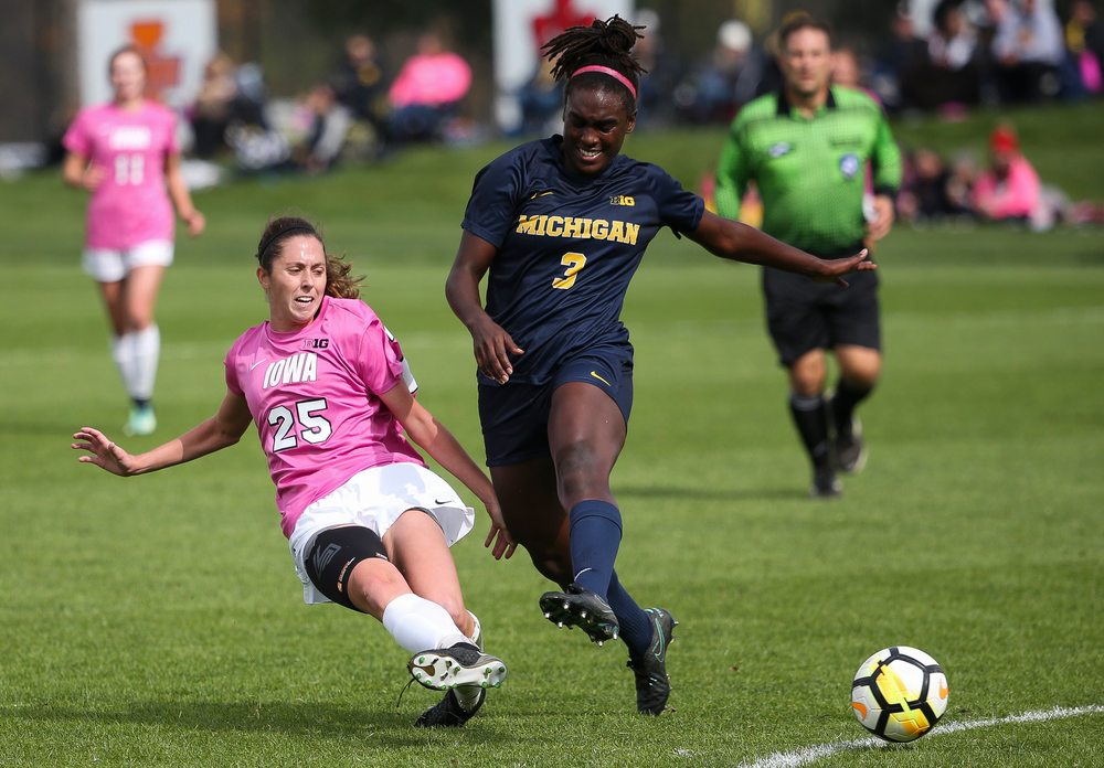 Iowa Hawkeyes midfielder Josie Durr (25) makes a tackle during a game against Michigan at the Iowa Soccer Complex on October 14, 2018. (Tork Mason/hawkeyesports.com)
