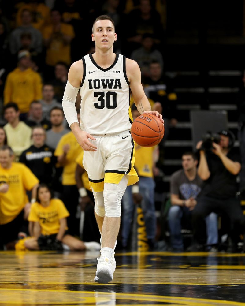 Iowa Hawkeyes guard Connor McCaffery (30) Iowa Hawkeyes guard CJ Fredrick (5) against the Michigan Wolverines Friday, January 17, 2020 at Carver-Hawkeye Arena. (Brian Ray/hawkeyesports.com)