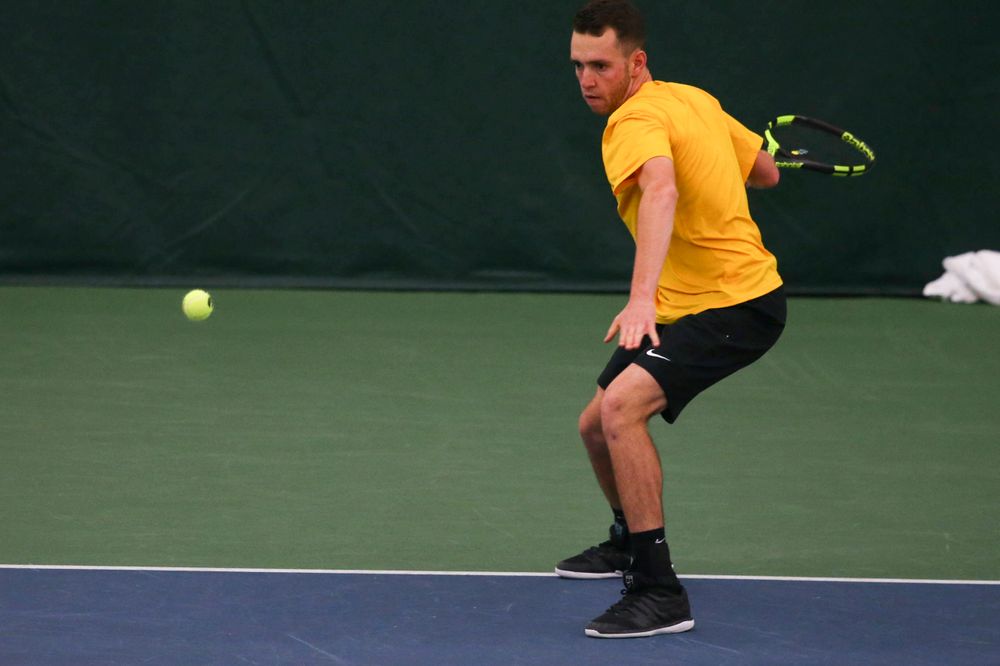 Iowa's Kareem Allaf at a tennis match vs Drake Friday, March 8, 2019 at the Hawkeye Tennis and Recreation Complex. (Lily Smith/hawkeyesports.com)
