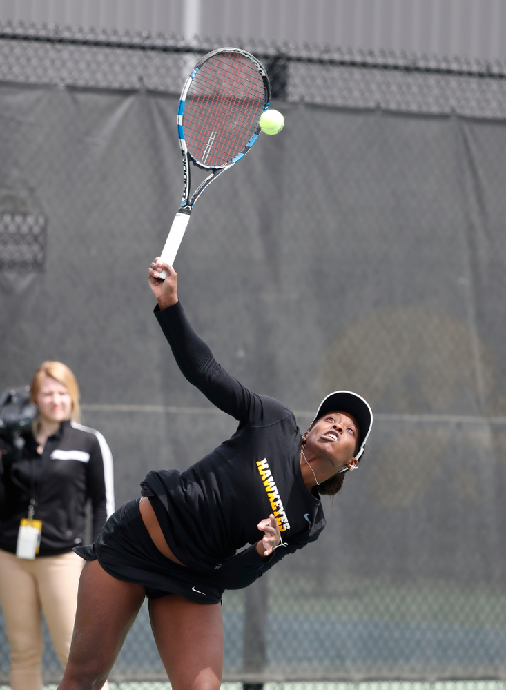 Adorabol Huckleby and Zoe Douglas play a doubles match against the Wisconsin Badgers Sunday, April 22, 2018 at the Hawkeye Tennis and Recreation Center. (Brian Ray/hawkeyesports.com)