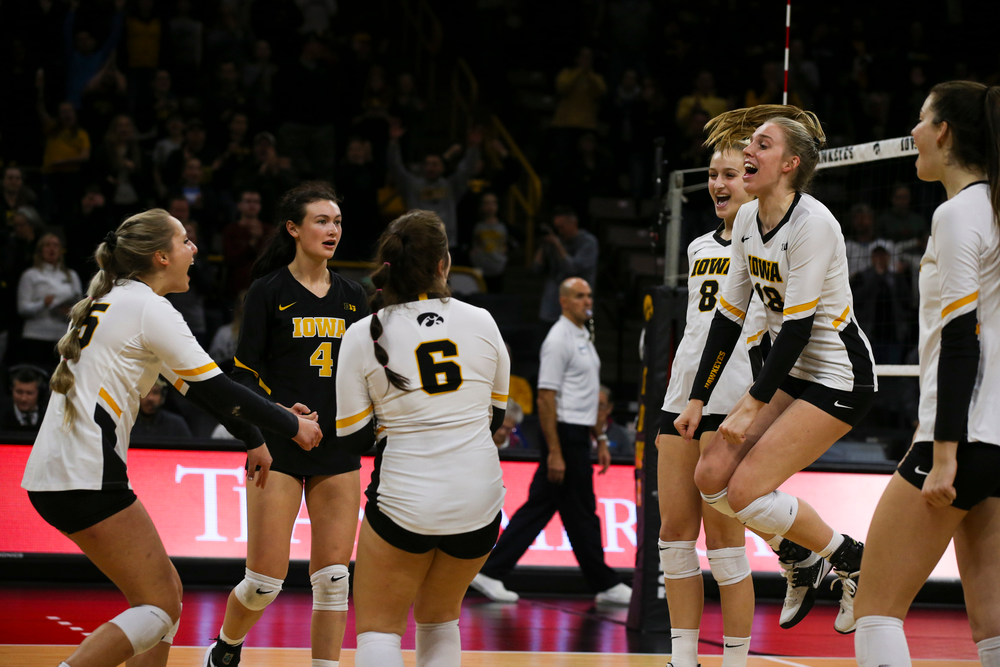 Iowa Hawkeyes defensive specialist Halle Johnston (4) and Iowa Hawkeyes middle blocker Hannah Clayton (18) during Iowa volleyball vs Maryland on Saturday, November 30, 2019 at Carver-Hawkeye Arena. (Lily Smith/hawkeyesports.com)