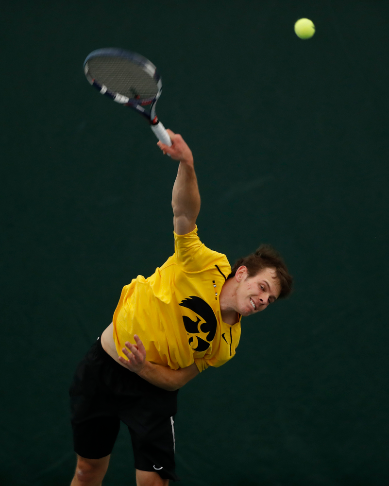 Piotr Smietana against the Illinois Fighting Illini Saturday, March 31, 2018 at Hawkeye Tennis and Recreation Center. (Brian Ray/hawkeyesports.com)