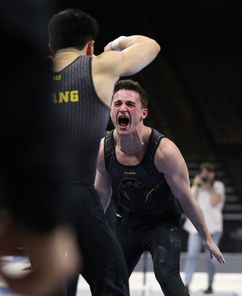 Iowa's Jake Brodarzon competes on the parallel bars against the Ohio State Buckeyes Saturday, March 16, 2019 at Carver-Hawkeye Arena. (Brian Ray/hawkeyesports.com)