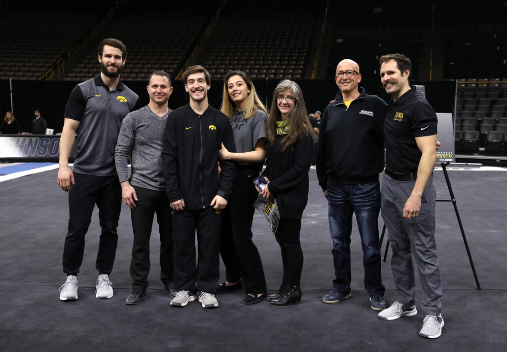 Iowa Men's Gymnast Kevin Johnson and his family during senior day ceremonies following their meet against the Ohio State Buckeyes Saturday, March 16, 2019 at Carver-Hawkeye Arena. (Brian Ray/hawkeyesports.com)