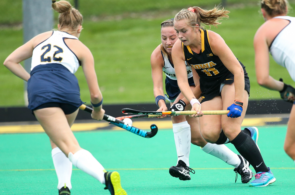 Iowa Hawkeyes midfielder Katie Birch (11) dribbles during a game against Michigan at Grant Field on October 5, 2018. (Tork Mason/hawkeyesports.com)