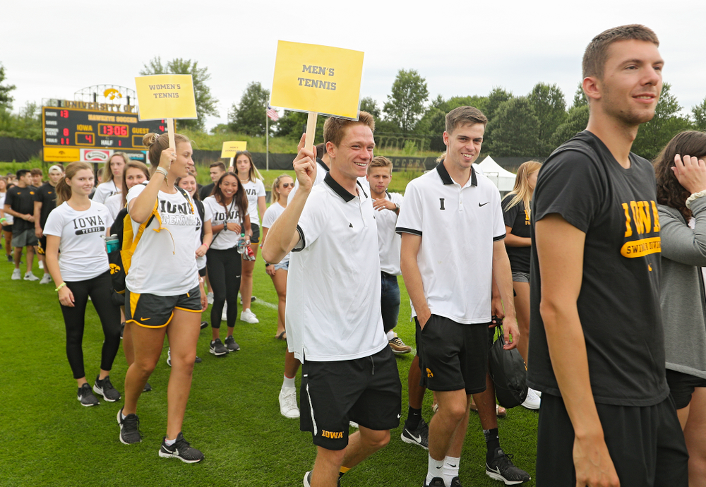 Student-athletes walk in the Parade of Champions during the Student-Athlete Kickoff at the Iowa Soccer Complex in Iowa City on Sunday, Aug 25, 2019. (Stephen Mally/hawkeyesports.com)