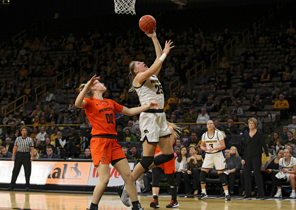 Iowa forward/center Monika Czinano (25) scores a basket during the fourth quarter of their overtime win against Princeton at Carver-Hawkeye Arena in Iowa City on Wednesday, Nov 20, 2019. (Stephen Mally/hawkeyesports.com)