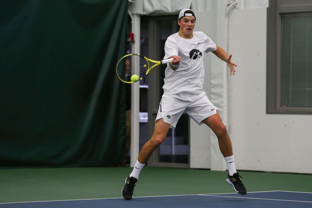 Iowa’s Joe Tyler hits a forehand during the Iowa men’s tennis match vs Western Michigan on Saturday, January 18, 2020 at the Hawkeye Tennis and Recreation Complex. (Lily Smith/hawkeyesports.com)