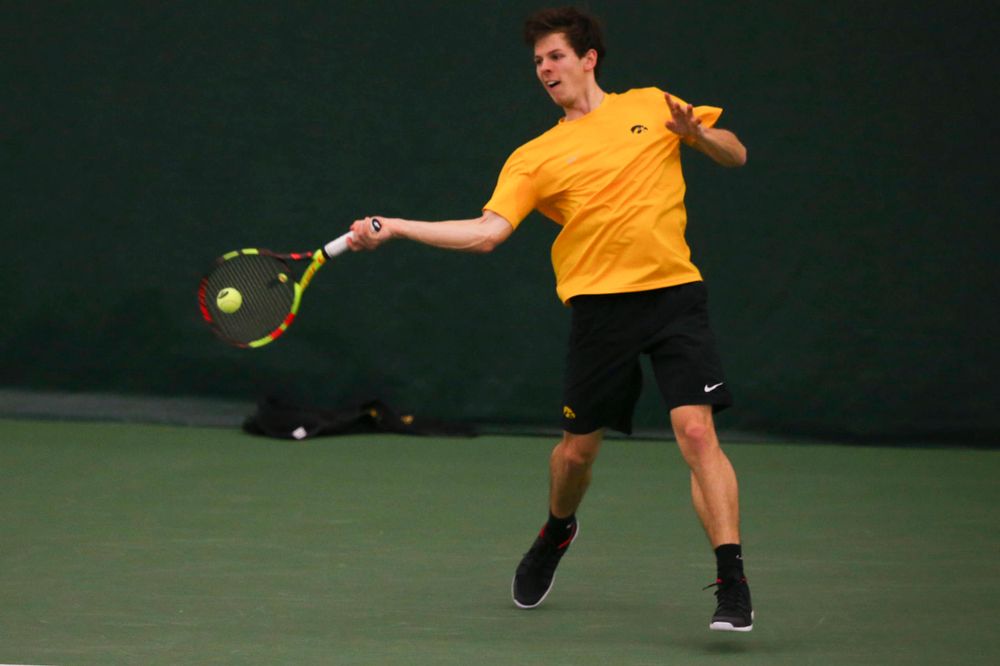 Iowa's Joe Tyler at a tennis match vs Drake Friday, March 8, 2019 at the Hawkeye Tennis and Recreation Complex. (Lily Smith/hawkeyesports.com)